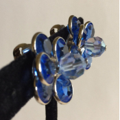 Deep blue glass flower earrings, side view